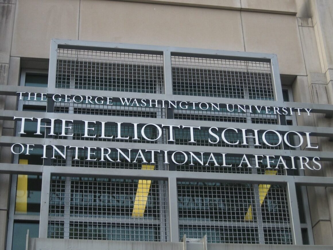 This image has an empty alt attribute; its file name is Elliott_School_Sign-edited-1160x870.jpeg